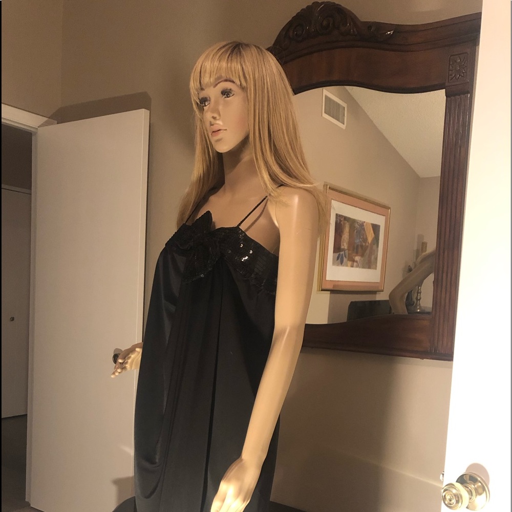 Ladies black cocktail dress by Party Formals.